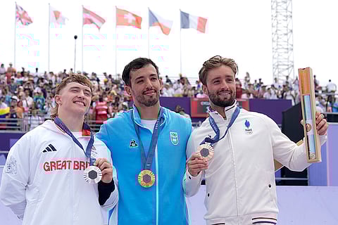 BMX freestyle men's park medal ceremony: Bronze medalist Anthony Jeanjean, of France, right with Silver and Gold medal winners